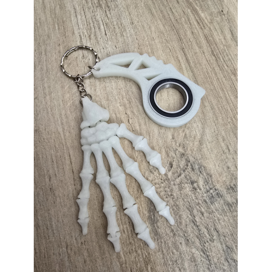 Świecący Keyspinner + Szkieletowa Dłoń 2w1- 3D KeyRambit KeyFlipper Fidget